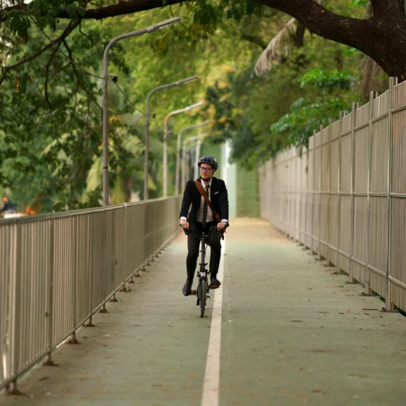 Businessman urban commuting with bike healthily and sustainable commute