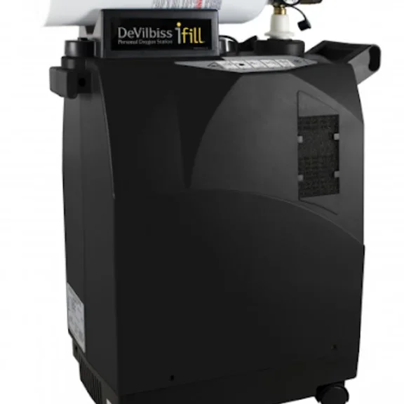 DeVilbiss iFill zuurstofvulsysteem met zwarte zuurstofconcentrator en witte zuurstoftank erbovenop, voor thuisgebruik en gemakkelijke mobiliteit.