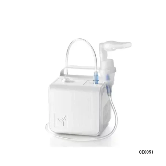 White tabletop nebulizer machine with a mask attachment and tubing, designed for efficient medication delivery to the lungs.