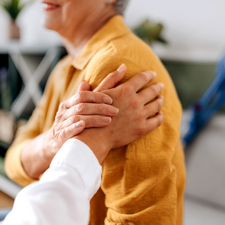 Healthcare caregiver at home - Getty Images