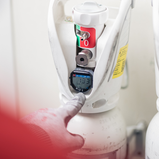 Technician replacing a cylinder 2